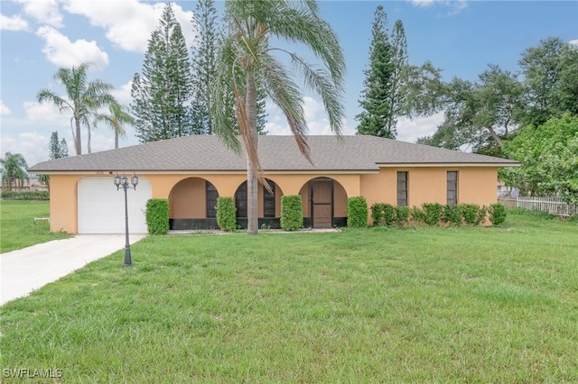 ranch-style house with a front yard and a garage