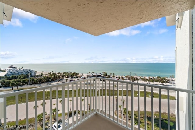 balcony featuring a water view