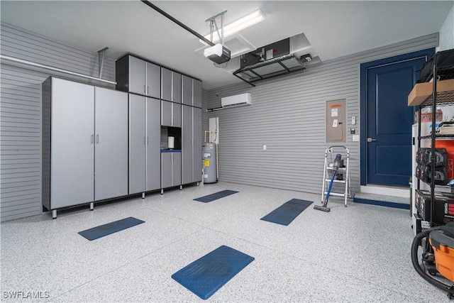 garage with an AC wall unit, a garage door opener, and water heater