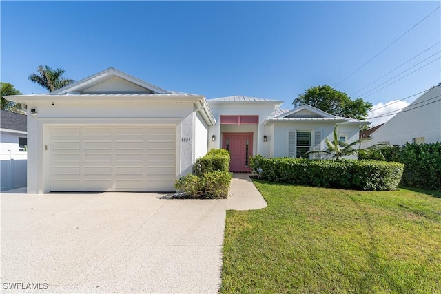 view of front facade featuring a garage and a front lawn