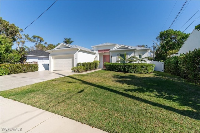 view of front facade featuring a garage and a front lawn