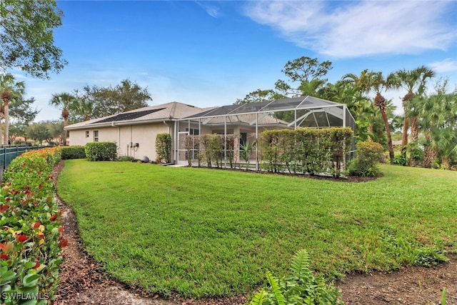 view of yard with a lanai