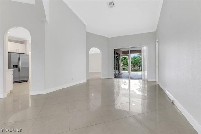 unfurnished room featuring light tile patterned floors