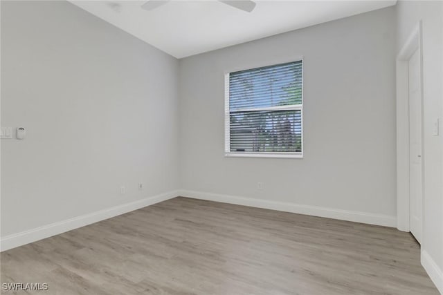 unfurnished bedroom featuring ceiling fan and light wood-type flooring