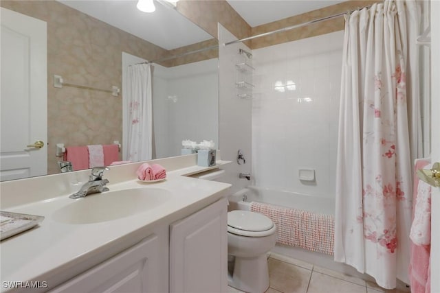 full bathroom with tile patterned flooring, shower / bath combo, vanity, and toilet