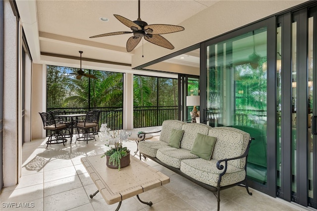 2550 Marquesa Royale Ln Unit 8-101, Naples, FL 34109 - sunroom featuring an outdoor hangout area, outdoor dining area, a raised ceiling, and ceiling fan