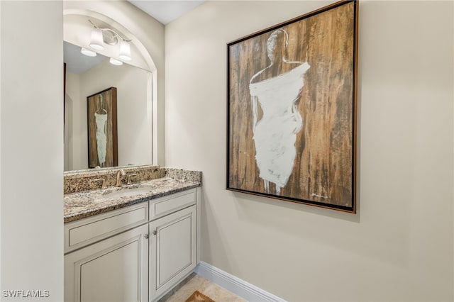 2550 Marquesa Royale Ln Unit 8-101, Naples, FL 34109 - bathroom with baseboards and vanity