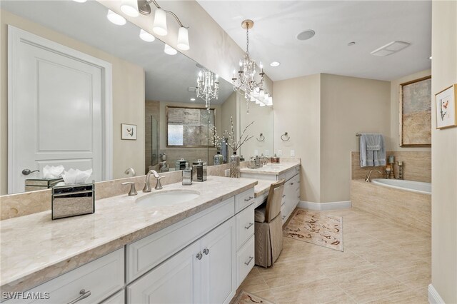 bathroom with vanity, separate shower and tub, and tile patterned floors