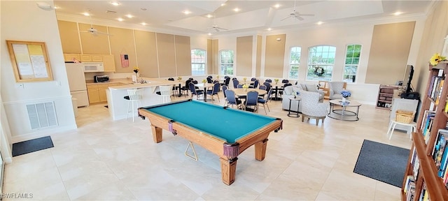 playroom with ceiling fan, a high ceiling, and billiards