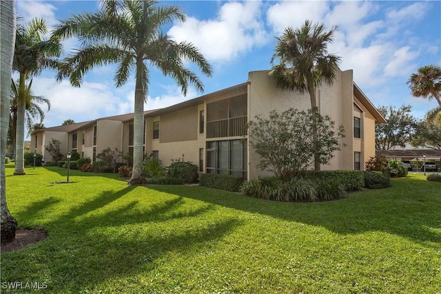 exterior space featuring a lawn