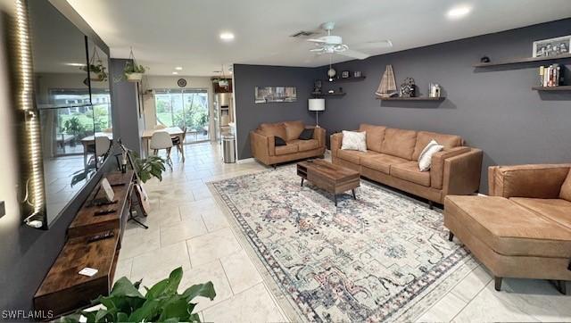 living room featuring ceiling fan