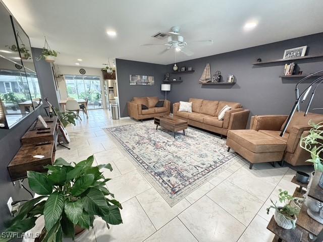 living room featuring ceiling fan