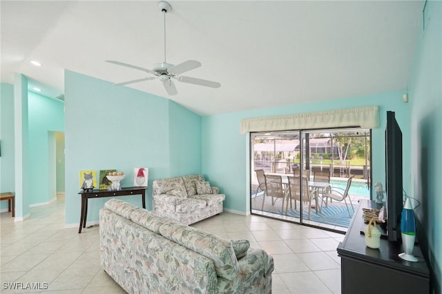 living room featuring light tile patterned floors and ceiling fan