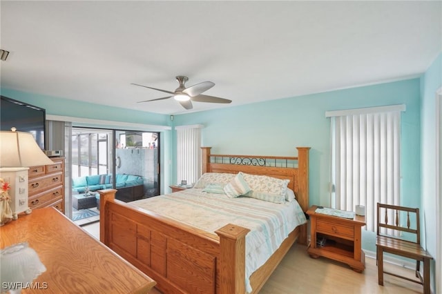 bedroom with light wood-type flooring, access to outside, and ceiling fan