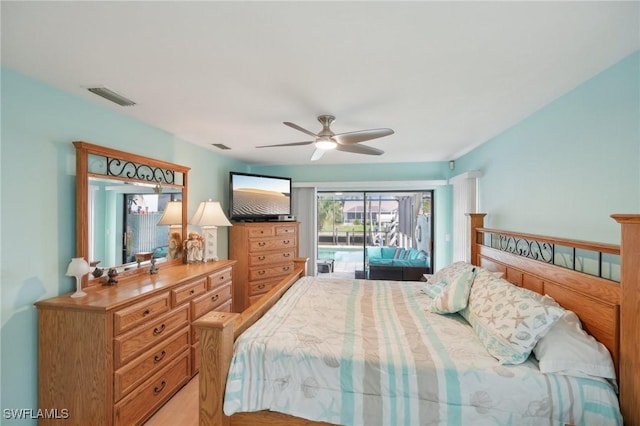 bedroom featuring ceiling fan and access to exterior