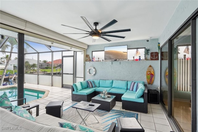 interior space featuring a wealth of natural light, light tile patterned floors, and ceiling fan