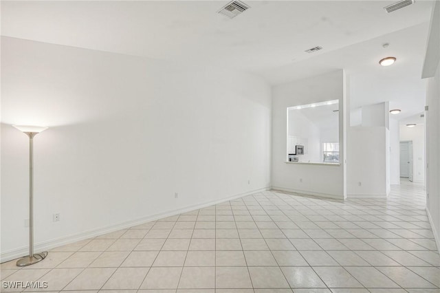 view of tiled spare room