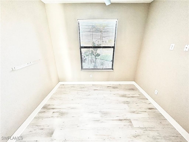 unfurnished room featuring light hardwood / wood-style flooring