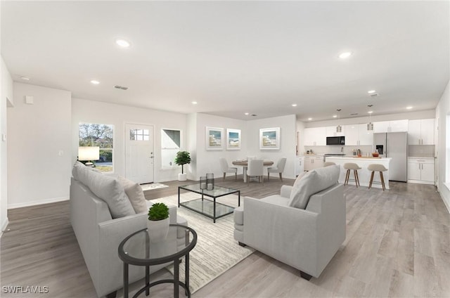 living room with light wood-type flooring