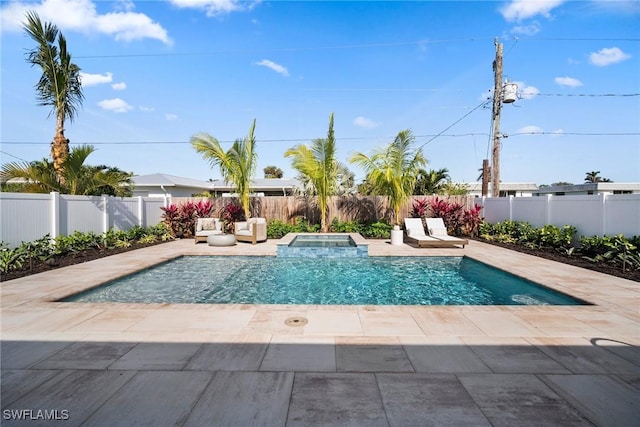 view of pool featuring an in ground hot tub