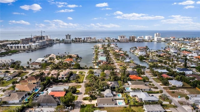 birds eye view of property featuring a water view