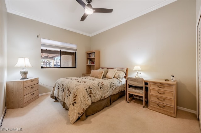 carpeted bedroom featuring ceiling fan and ornamental molding