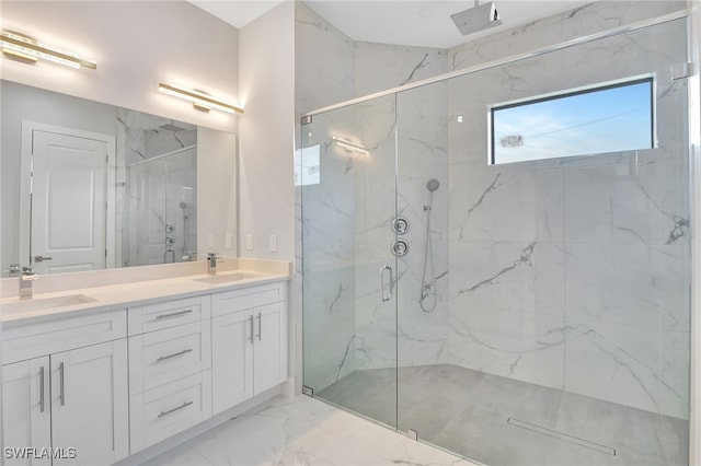 bathroom with vanity and an enclosed shower