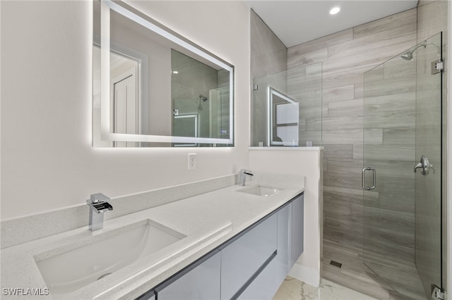 bathroom with vanity and walk in shower