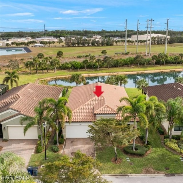 drone / aerial view featuring a water view