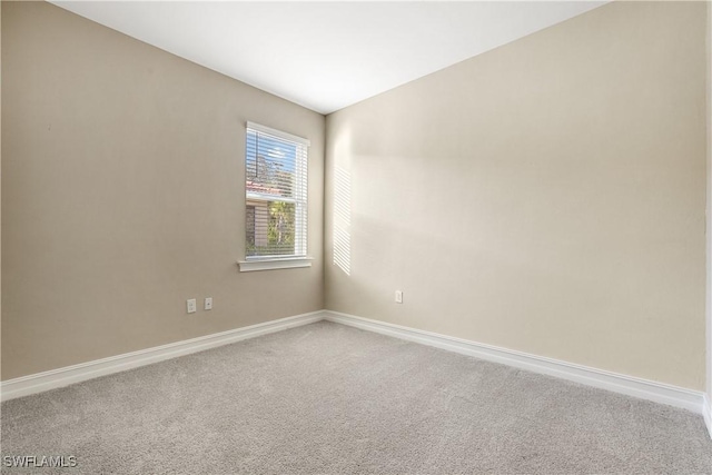 empty room featuring carpet floors