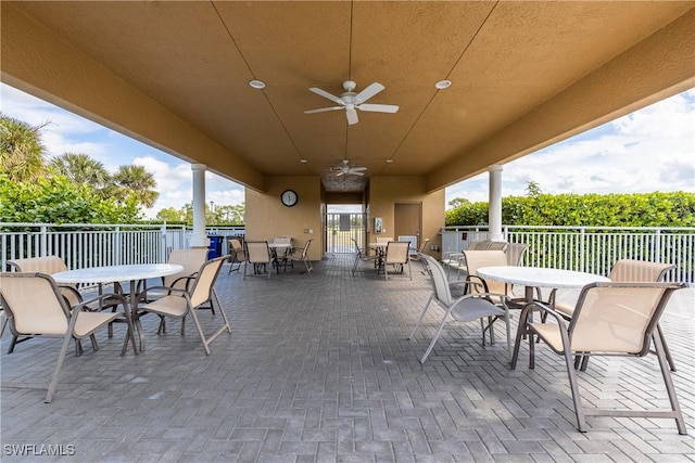 view of patio featuring ceiling fan