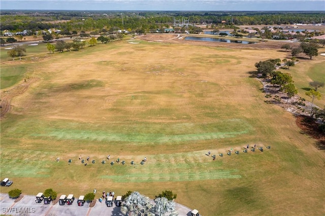 drone / aerial view featuring a water view and a rural view