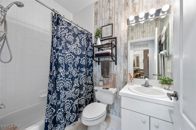 full bathroom with tile patterned flooring, shower / bath combination with curtain, toilet, wooden walls, and vanity