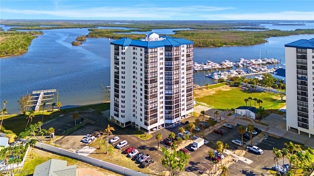 drone / aerial view featuring a water view