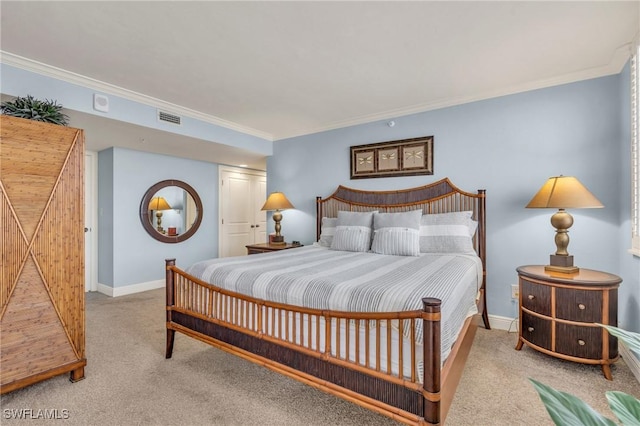 bedroom with ornamental molding, visible vents, and light colored carpet