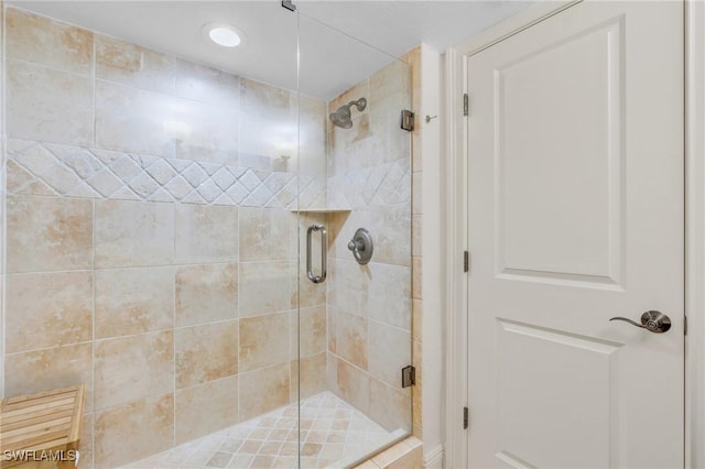 bathroom with a stall shower