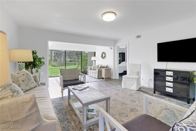 living room featuring hardwood / wood-style flooring