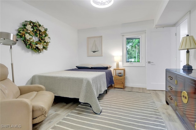 bedroom featuring light hardwood / wood-style floors