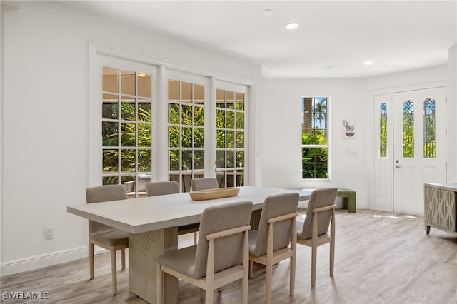 dining area with light wood-type flooring