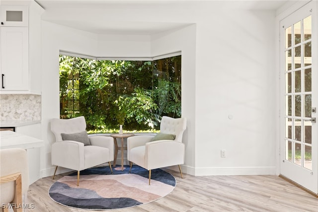 living area featuring light hardwood / wood-style floors