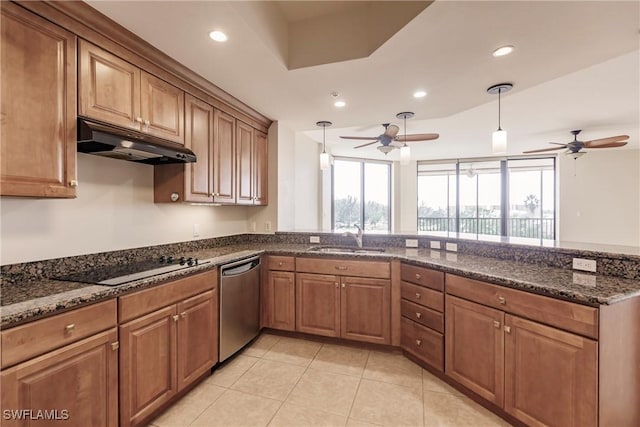 kitchen featuring dishwasher, sink, hanging light fixtures, dark stone counters, and black electric cooktop