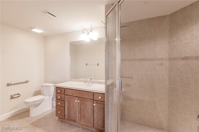 bathroom with tile patterned floors, vanity, toilet, and an enclosed shower