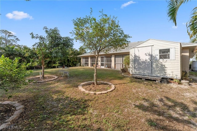 view of yard with a storage unit