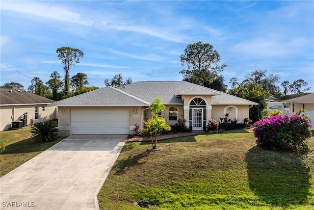 ranch-style house with a front yard, a garage, and central air condition unit