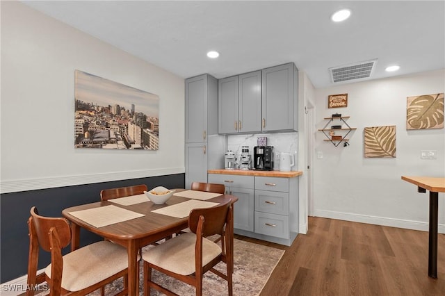 dining space with light wood-type flooring