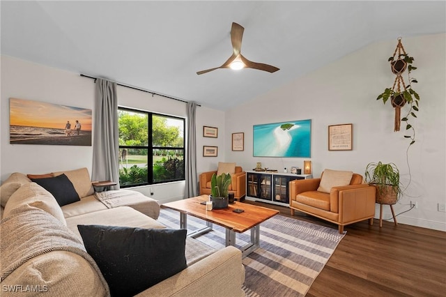 living room with hardwood / wood-style floors, ceiling fan, and lofted ceiling