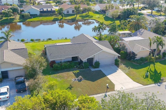 drone / aerial view featuring a water view