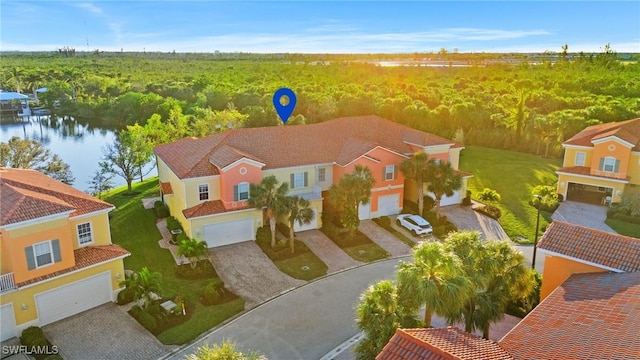 bird's eye view with a water view