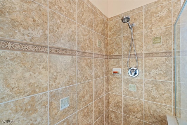 room details with a tile shower