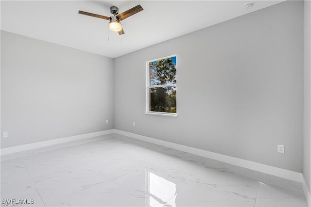 unfurnished room featuring ceiling fan